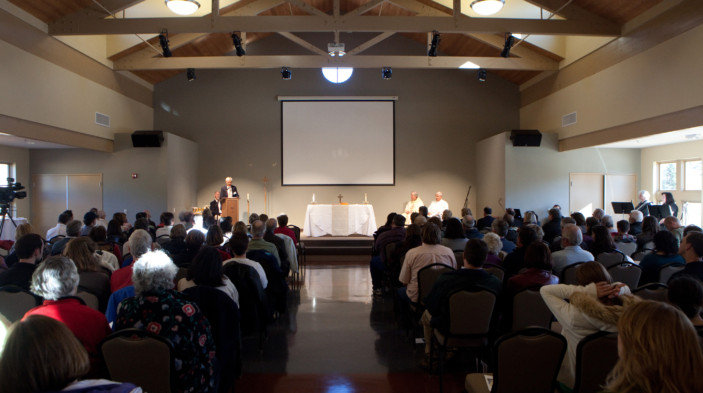 Founders Hall interior during mass with people