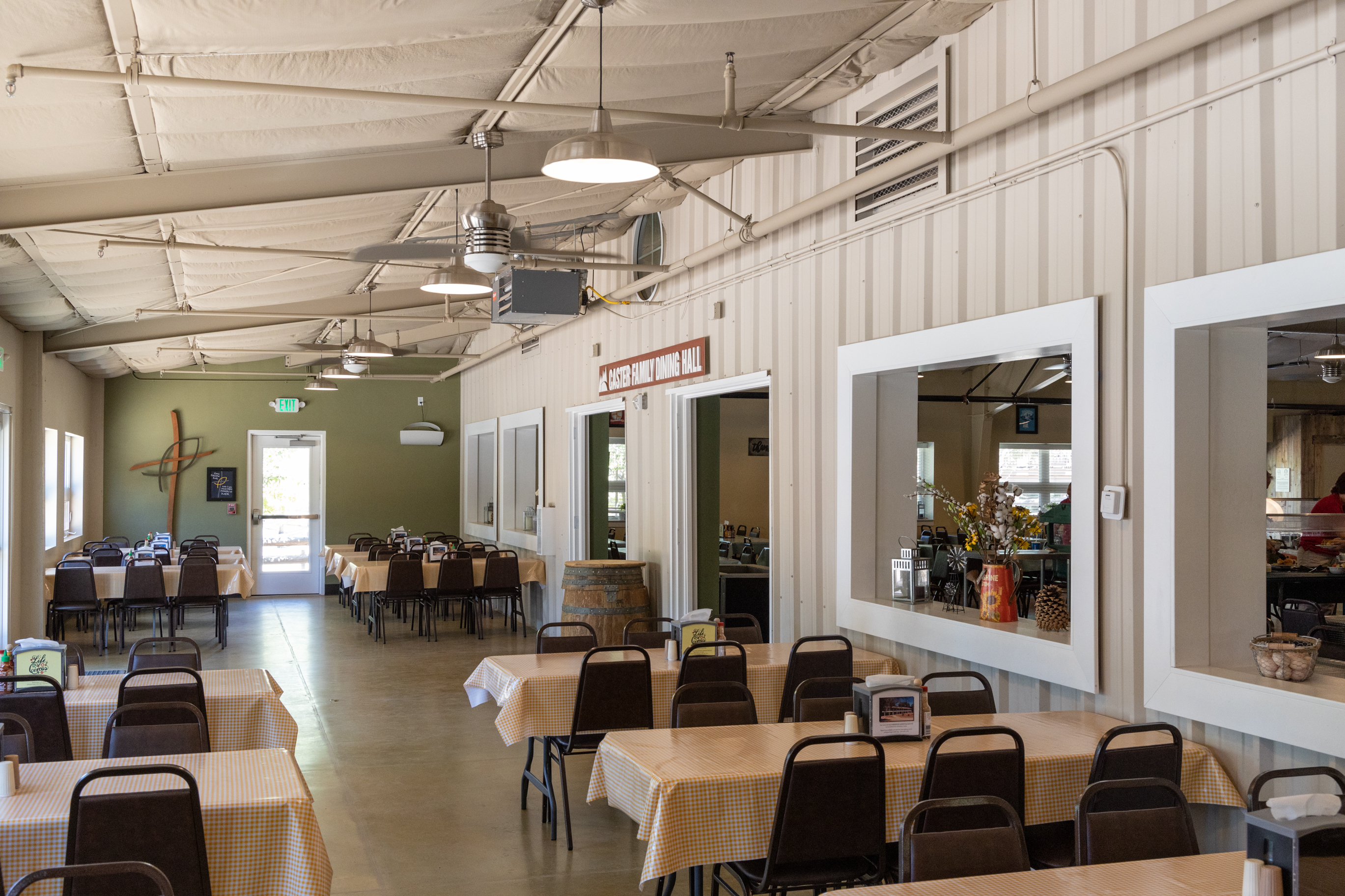 Dining Hall west wing with tales and chairs