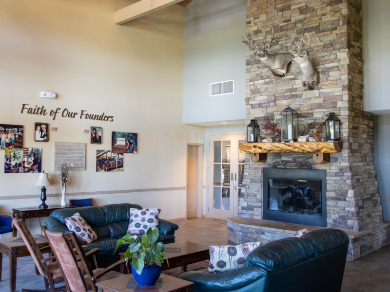 Disciples Lodge foyer with seating and fireplace