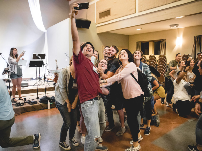 Young Adults taking selfie in Founders Hall