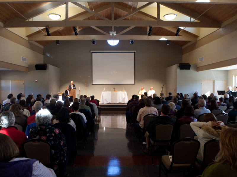 Founders Hall interior during mass with people