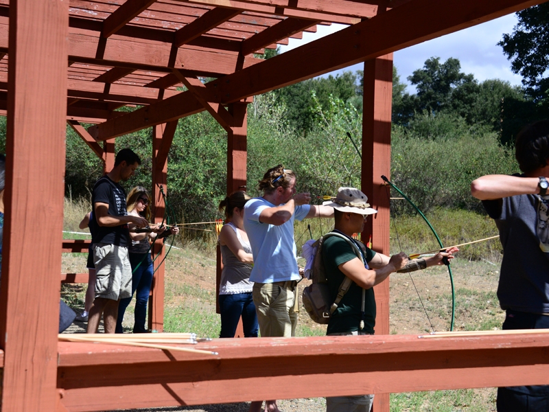 Archery players with bows and arrows