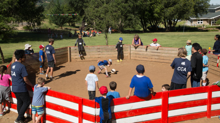 Kids and CCAs playing in Gaga Pit during Family Camp