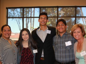 Scholarship recipient family speakers at Women's Auxiliary fundraising brunch