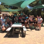 YoungLives moms and their babies and children on Dining Hall patio